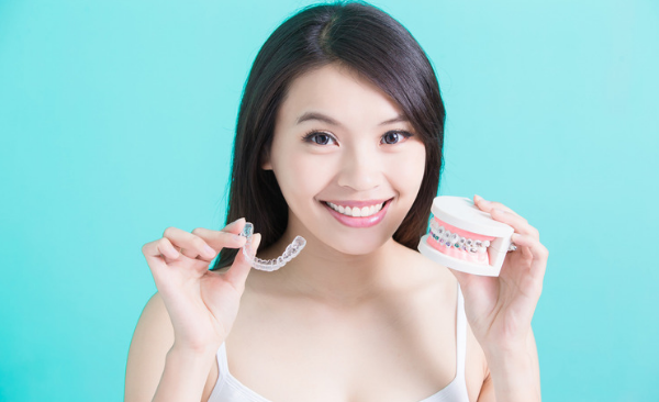 Woman chooses invisible aligners instead of traditional braces