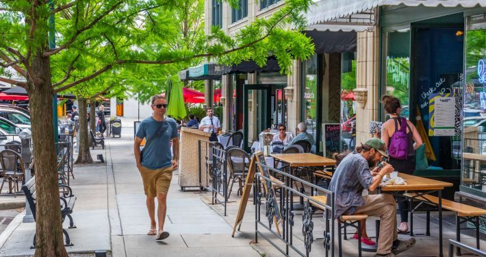 Man walking down street in downtown Asheville