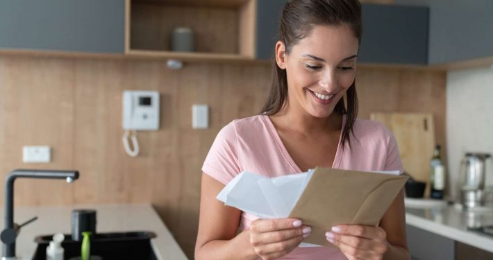 Woman excited to win the Impressions lottery in Asheville