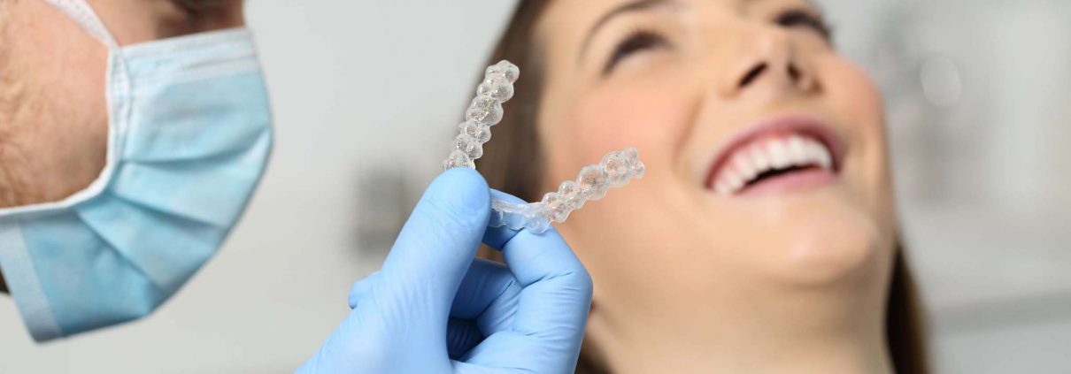 Woman smiles during Impressions aligners consultation in Asheville, NC