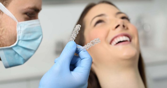 Woman smiles during Impressions aligners consultation in Asheville, NC
